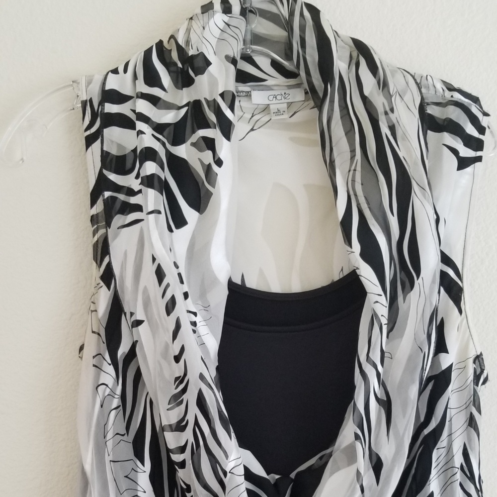 Cach'e black & white animal print silk top.